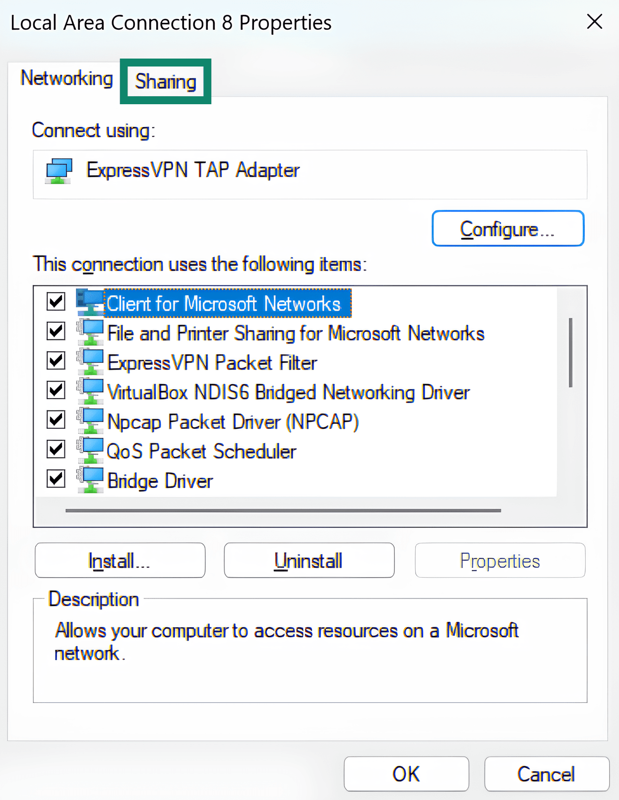 Opening sharing options in ExpressVPN TAP Adapter settings.