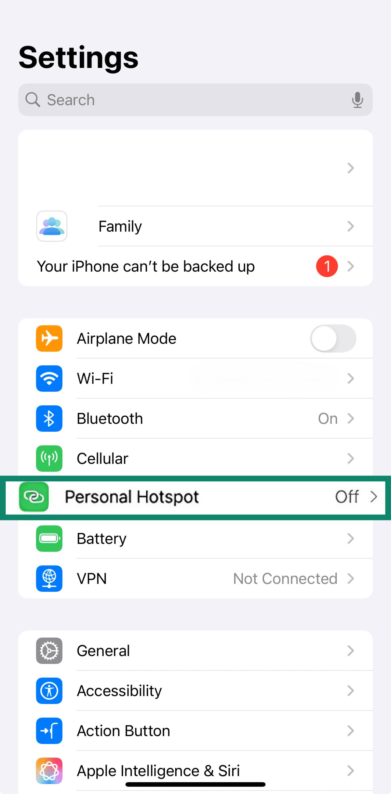iPhone settings menu with Personal Hotspot highlighted.